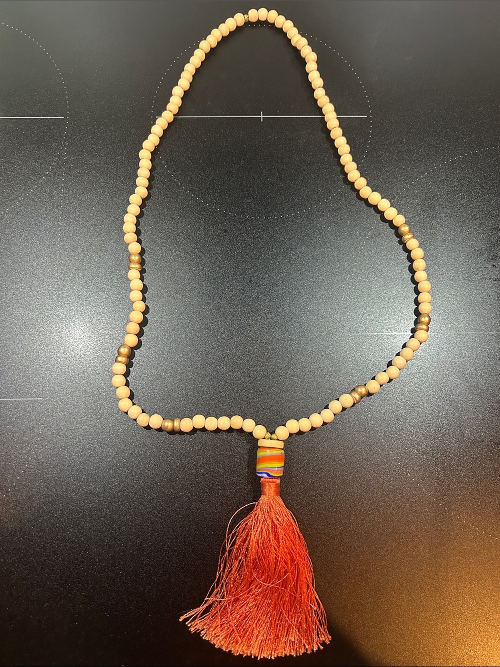 Handmade Cream Wood Bead Necklace with Orange Tassel